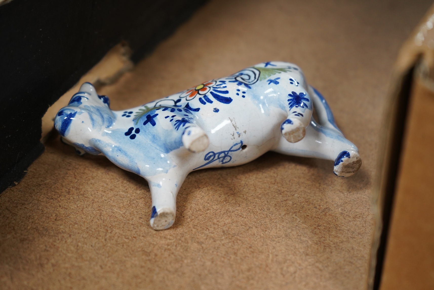 A collection of early 20th century French faience glazed animals, mostly cattle, largest 15cm